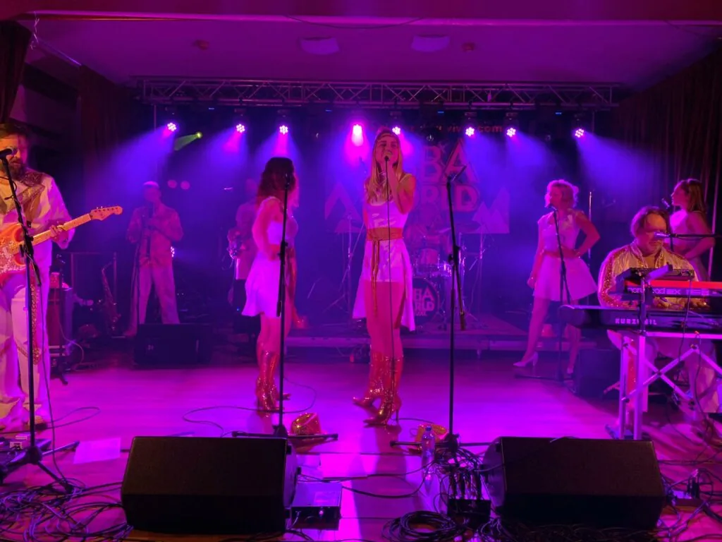 A band lit in purple