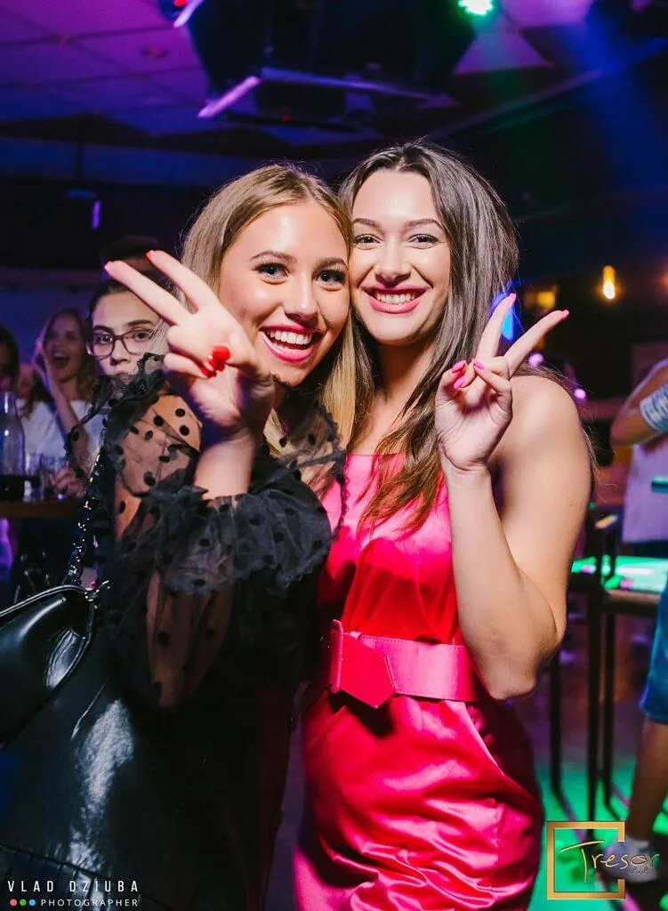Guests wearing party glasses